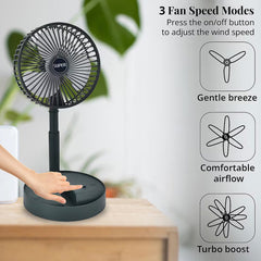 Compact desk fan with phone holder